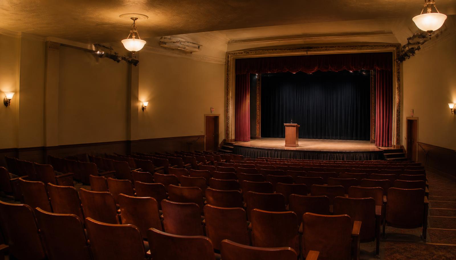 Interior of a warm, intimate theater set for worship
